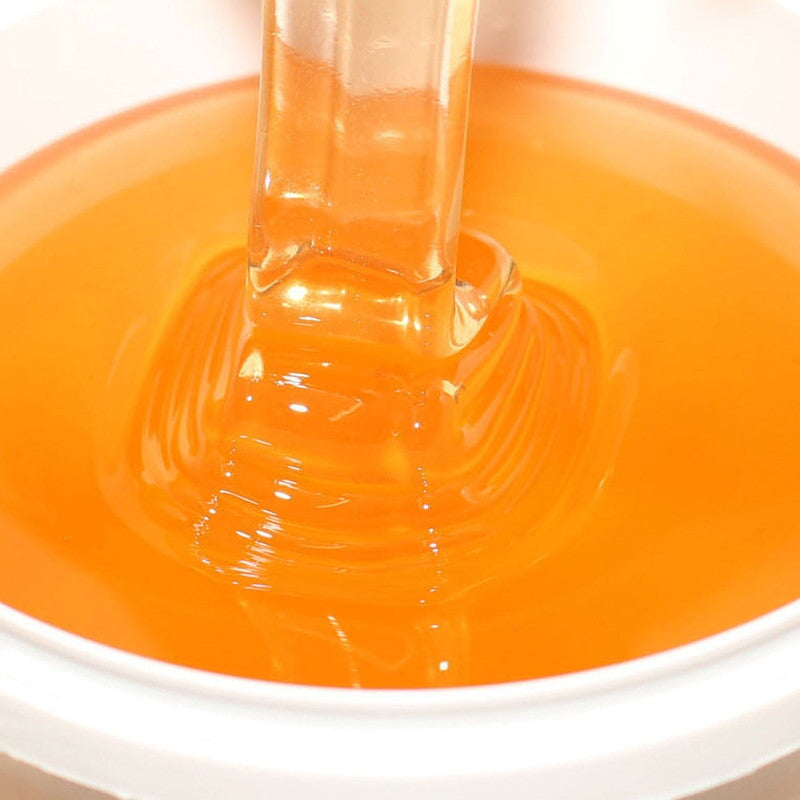 Akazienhonig fluessig hellgold — cremige Konsistenz lange fluessig — Mishas Honey